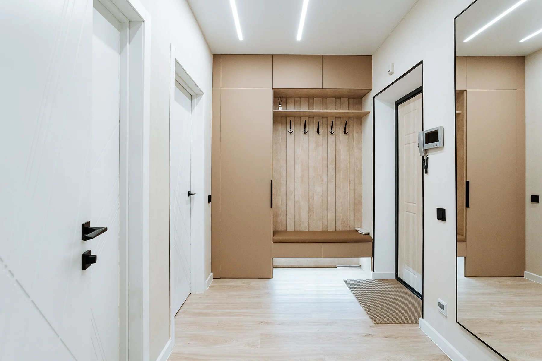Clean modern entryway reflecting a calm and organized client experience